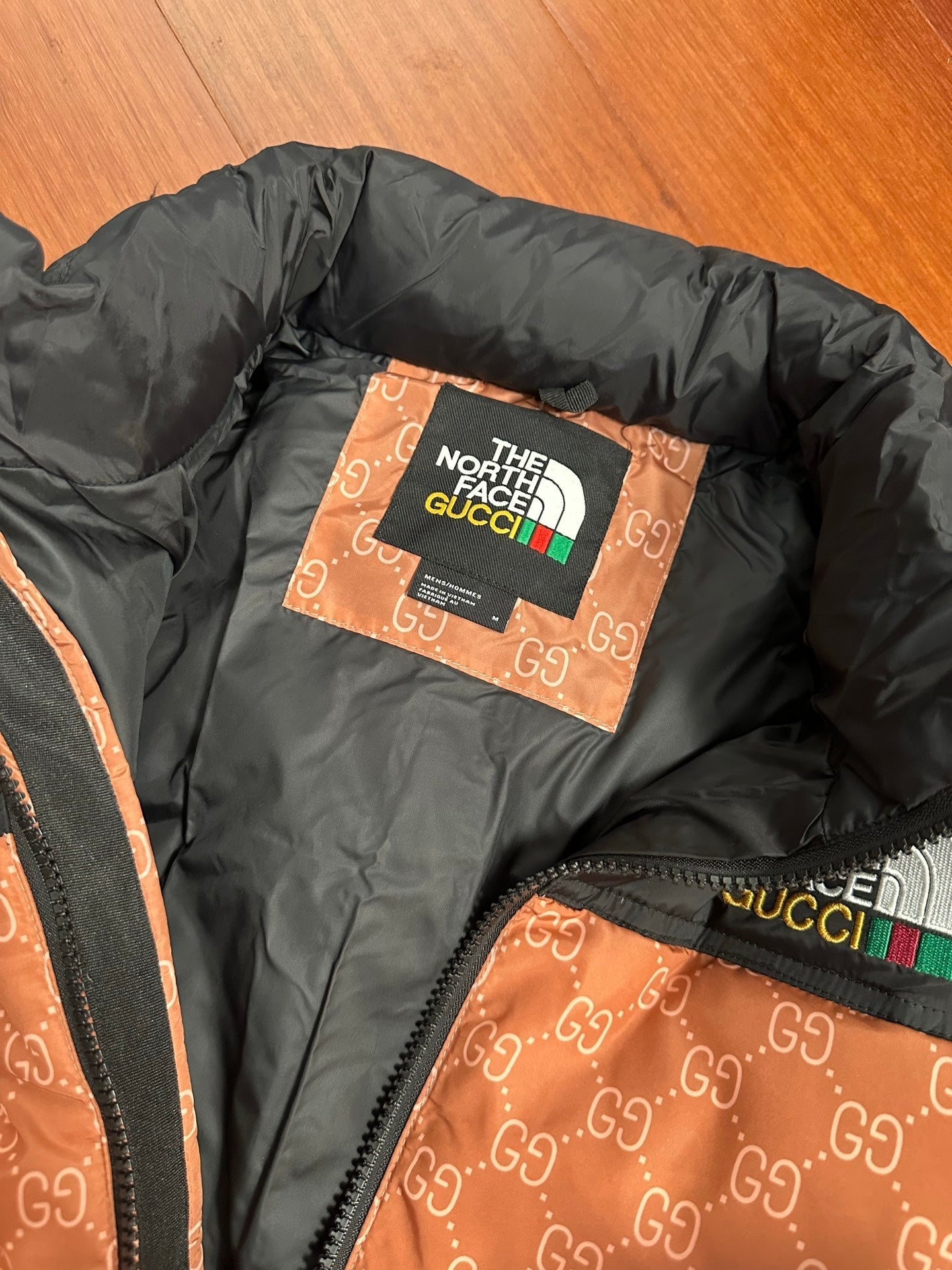 North Face and Gucci's joint down Giacca